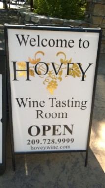sign for wine tasting hours